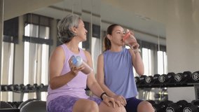 Young adult active middle age old female drink whey energy shake bottle diet food after gym workout. Self Love health care older aged woman asia elder people happy relax sport protect aging life. - Powered by Shutterstock - Get 15% off with code: PIKWIZARD15