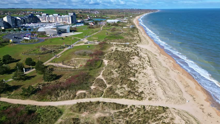 Plage de Graye-sur-Mer and Juno Beach Centre, Normandy, France. Aerial sideways