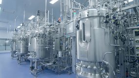 Workshop high-tech stainless steel industrial processing tank control panel for automation, advanced industrial equipment production of pharmaceutical biopharmaceuticals in modern production facility - Powered by Shutterstock - Get 15% off with code: PIKWIZARD15