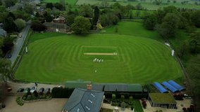 Rural Cricket Team Gears Up – Static Drone View of Match Preparations - Powered by Shutterstock - Get 15% off with code: PIKWIZARD15