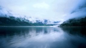 Serene Mountain Lake Landscape with Misty Peaks and Calm Waters - Powered by Shutterstock - Get 15% off with code: PIKWIZARD15
