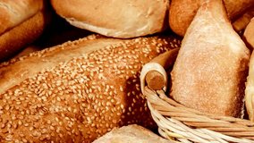 Artisan Breads in Woven Basket, Close-Up View - Powered by Shutterstock - Get 15% off with code: PIKWIZARD15