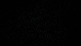 Tiny dust randomly flying in the smoky air, empty space template for objects. Many golden glitter particles powder falling, floating on empty black contrast background. Slow motion. - Powered by Shutterstock - Get 15% off with code: PIKWIZARD15