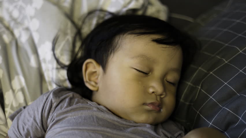 Toddler Taking Nap Time, Background for advertising and wallpaper in relaxion and lifestyle scene.