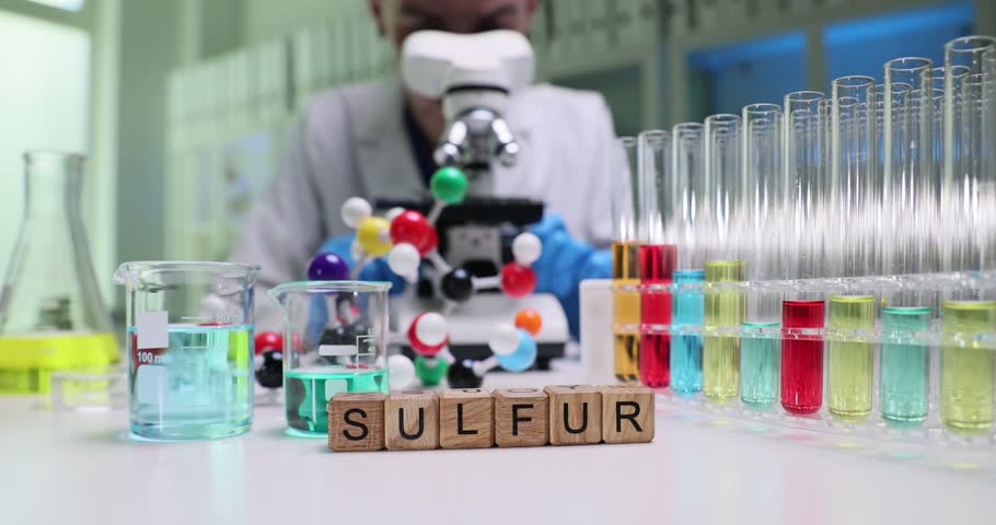 This dynamic lab scene is centered on sulfur analysis, showcasing vibrant chemical mixtures and intricate molecules