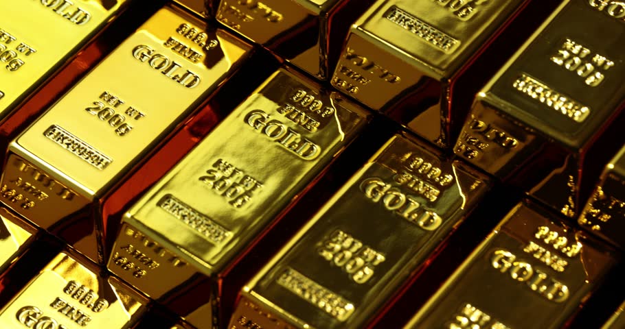 Neatly stacked gold bars create striking display reflecting light. Symbolization of wealth investment and financial security with shiny surfaces
