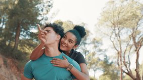 Couple, love and piggyback for fitness in nature for exercise, fun training and playful break. Smile, people and embrace with support, romance and bonding together for sightseeing for travel workout - Powered by Shutterstock - Get 15% off with code: PIKWIZARD15