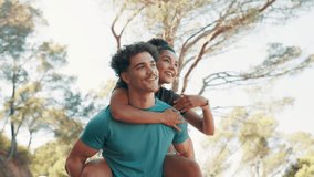 Couple, pointing and piggyback for fitness in nature for exercise, fun training and playful break. Smile, people and embrace of support, romance and bonding together for sightseeing of sports workout - Powered by Shutterstock - Get 15% off with code: PIKWIZARD15