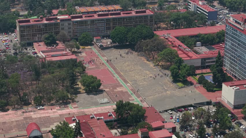 Sunny day aerial perspective of people on university campus