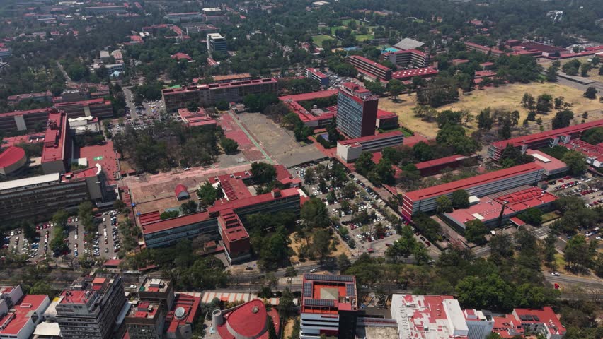 Drone view people walking on sunny university campus