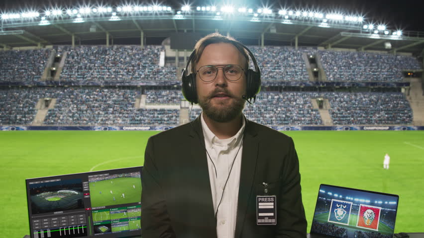 Playback Template for Television News Program with Sports Commentator Covering a Live Soccer Championship. Male Host Wearing Glasses and Headphones, Describing What is Happening on a Field to Viewers - Powered by Shutterstock - Get 15% off with code: PIKWIZARD15