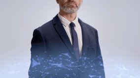 Confident bearded man in elegant suit extending hand while glowing holographic globe floating above palm. Digital network connections surrounding figure. Global communication and innovation. - Powered by Shutterstock - Get 15% off with code: PIKWIZARD15