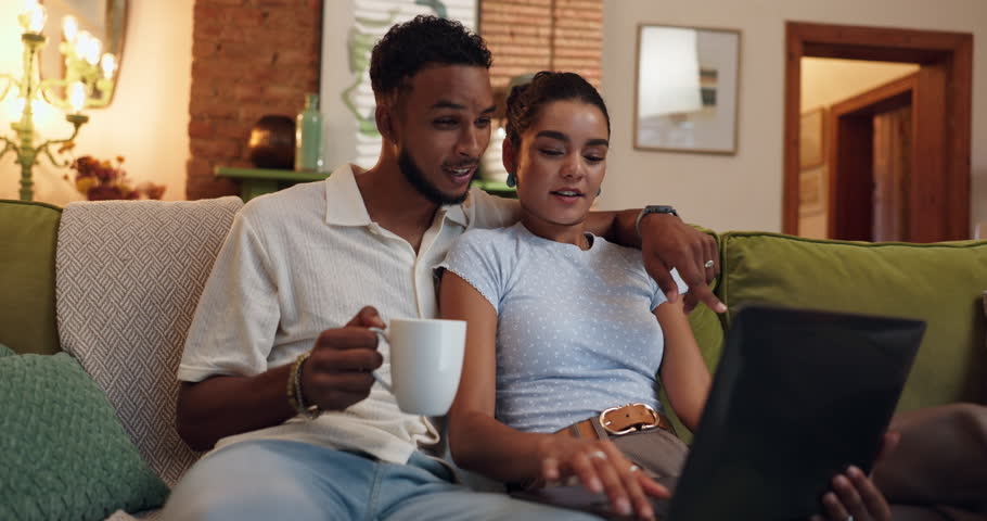 Streaming, chilling and couple with laptop, home and bonding with entertainment, watching or lounge. Apartment, man and woman with tech for film, coffee and browsing on web for date, online and house
