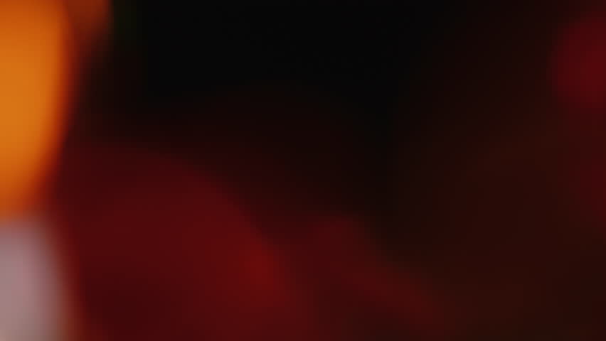 Multicolored light leaks 4k footage on black background. Lens studio flare leak burst overlays. Natural lighting lamp rays bokeh effect. For compositing over your footage, stylizing video, transitions