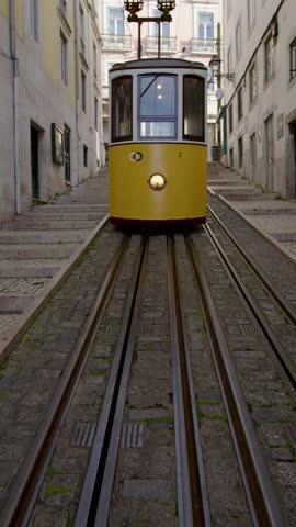 Journey Through the Streets of Lisbon: A Scenic Ride on the Iconic Yellow Tram, Exploring the Charming Small City in Realtime, Vertical Format for Mobile View
