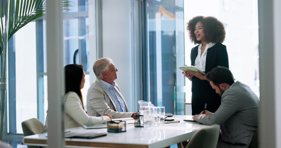Boardroom, meeting and woman with tablet, talking and brainstorming for sales in company and group. Business, account manager and people with ideas for financial growth, teamwork and colleagues