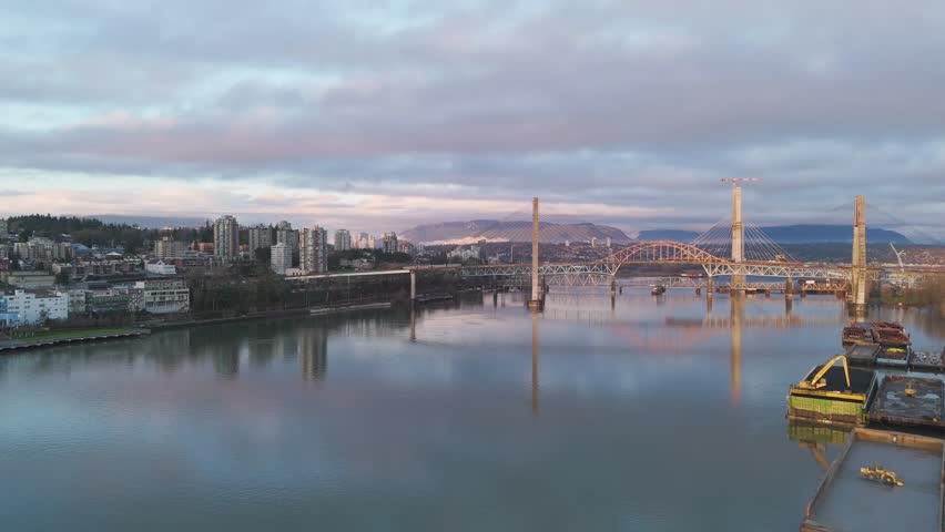 New Westminster Cityscape at Sunrise With River and Bridges in British Columbia
