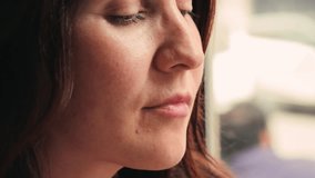 Close-up of a girl visitor to a cafe biting off eating Traditional Argentine dessert Alfajores. High quality 4k footage - Powered by Shutterstock - Get 15% off with code: PIKWIZARD15