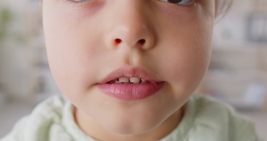 Happy funny kid, little child opening mouth showing tongue, small patient passing health check-up in pediatric otolaryngology clinic, medical aid, otolaryngologist examine, throat pain complaints