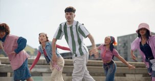 Happy, outdoor and dancing with people in city for hip hop, choreography and performance together. Creative crew, artist and friends with exercise in group for flash mob, energy and celebration - Powered by Shutterstock - Get 15% off with code: PIKWIZARD15