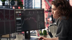 Stock market investor monitors digital charts and candlestick patterns on financial interface. PC displays trading statistics, make data driven investment decisions and manage risks. Camera B. - Powered by Shutterstock - Get 15% off with code: PIKWIZARD15