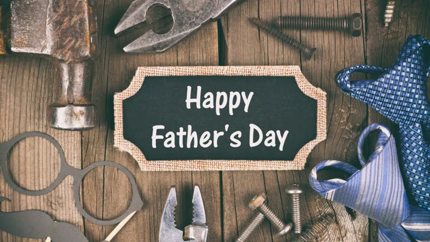 Happy Fathers Day greeting with ties and tools. Slow zoom motion video.