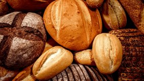 Assorted Artisan Breads and Rolls, Bakery Products, Close-Up View - Powered by Shutterstock - Get 15% off with code: PIKWIZARD15