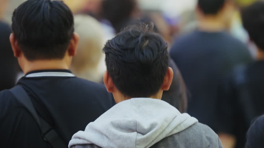 Lots of people walk city street. Crowded busy urban road rush hour. Many pedestrians stroll downtown. Chinese asian men going. China life day. Overcrowded roadway. Huge big mob. Large public group.