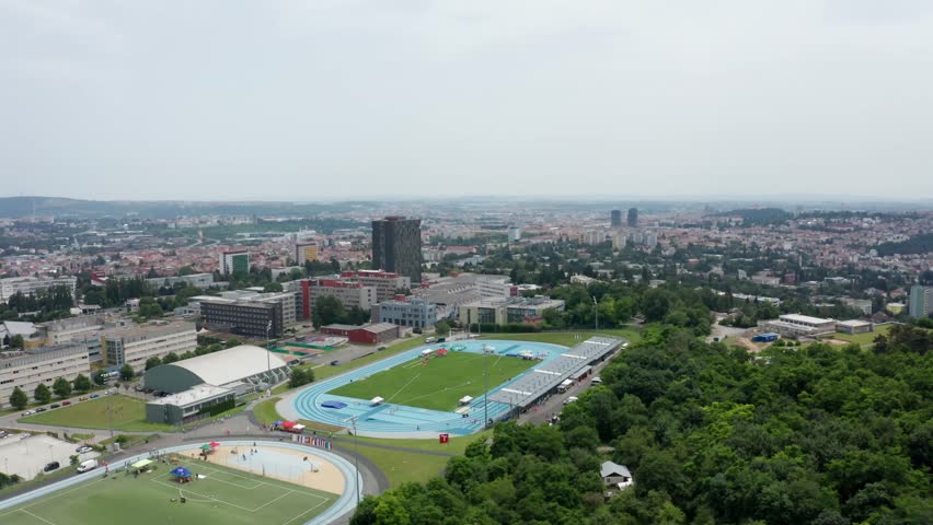 wide drone shot of sport stadium in brno city