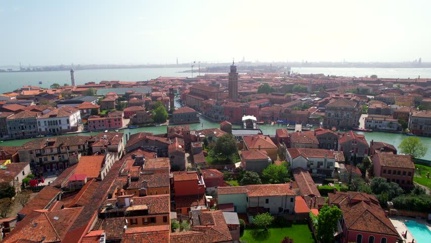 Picturesque island of Murano and it´s water canals. Aerial.