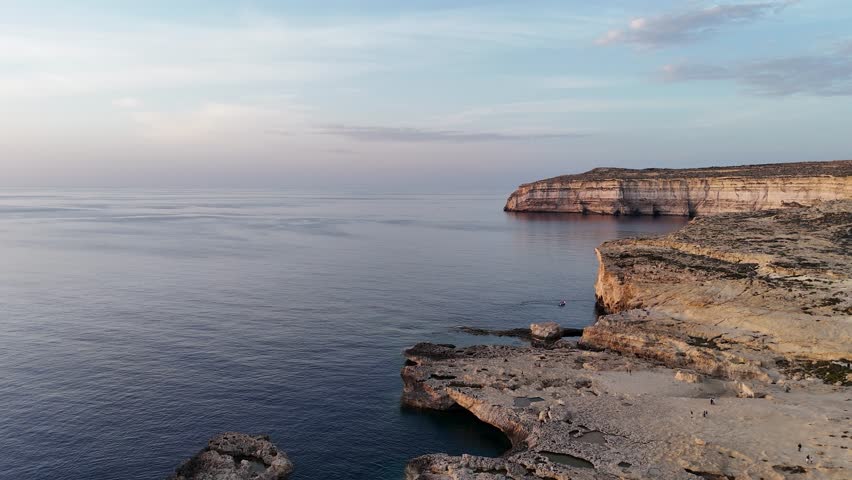 Aerial view of Dwejra coastline and scenic limestone cliffs with rocky bay on Gozo Island, Malta – 30 October 2024
