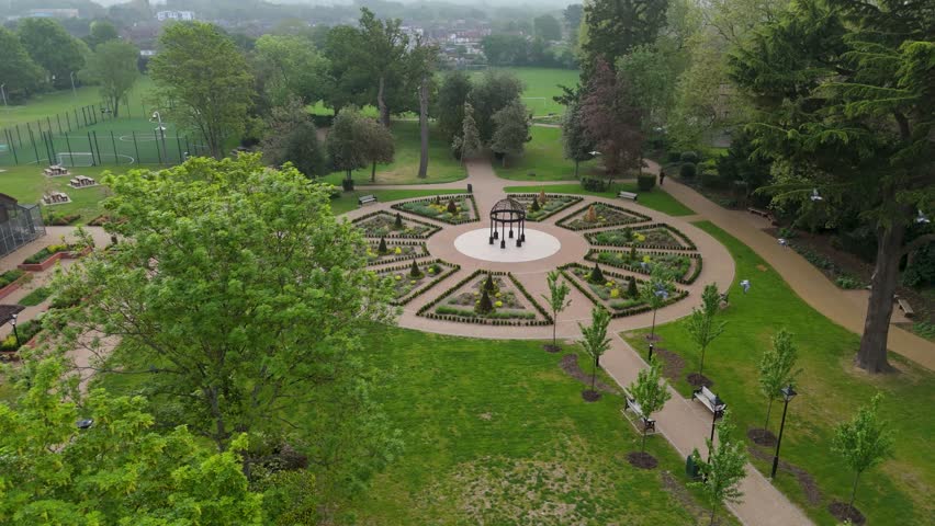 Ascending Drone Orbit Left Around Circular Garden and Edwardian Pagoda at Grundy Park, UK