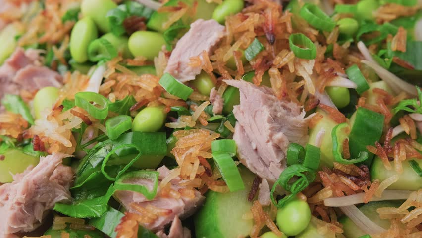 Crispy Rice Tuna Salad with edamame beans, cucumber, onion