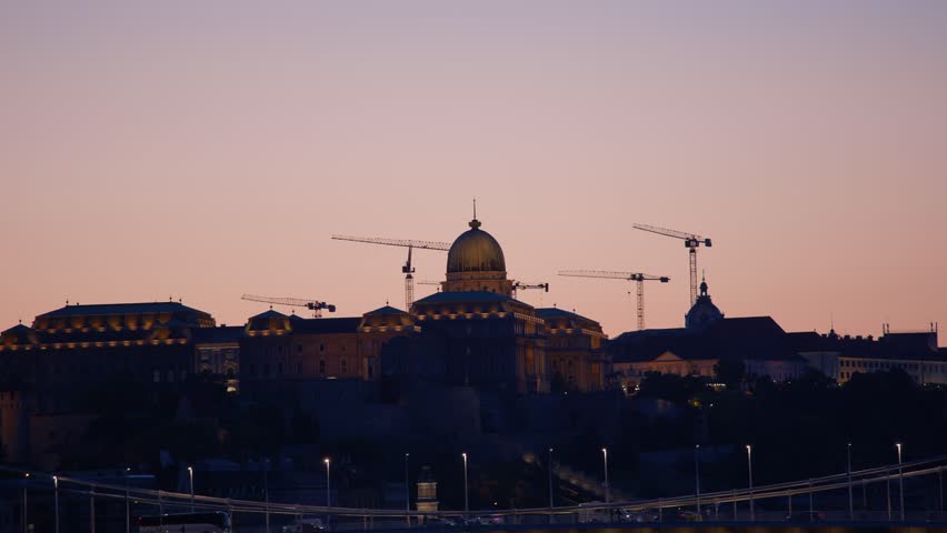 The Széchenyi Chain Bridge And Buda Castle At Night In Budapest, Hungary. Handheld Shot