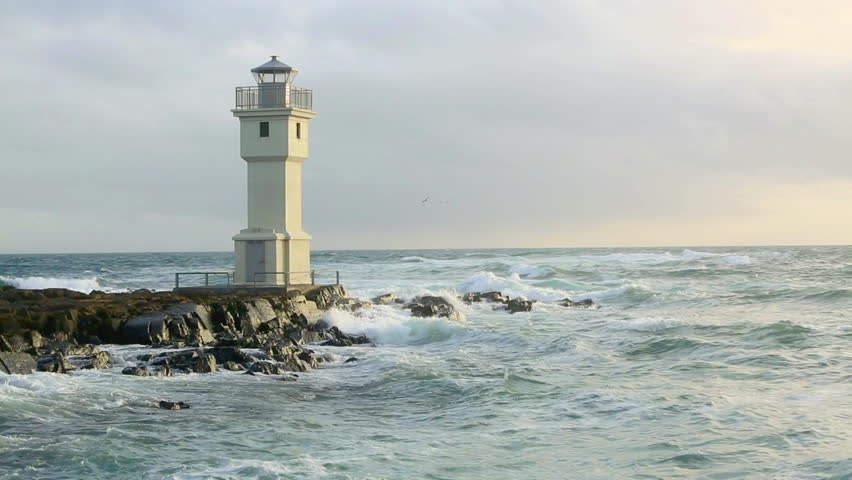 White lighthouse at the port of Akranes, Iceland in springtime, high definition video