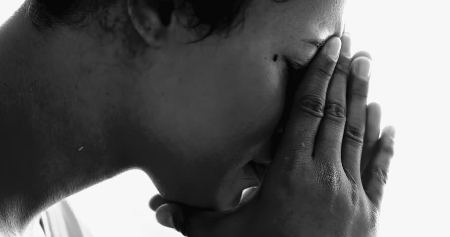 Intense Young African American in Mental Illness Struggle – Dramatic Monochromatic, Quiet Despair of 20s Girl Covering Face suffering from depression