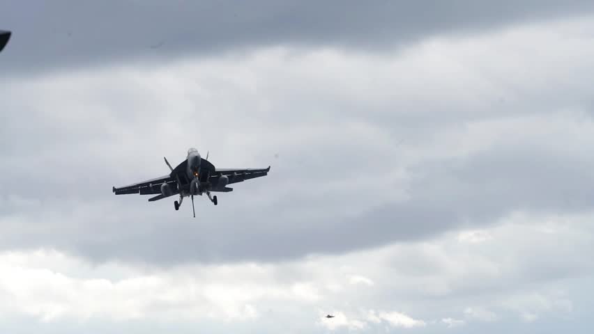 FA-18E Super Hornets conduct flight operations aboard Nimitz class aircraft carrier USS Carl Vinson CVN 70.