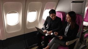 the executive and his secretary are shaking hand, two businessmen successfully negotiated a merger while they were on a plane to sign the contract so they shook hands, handshake - Powered by Shutterstock - Get 15% off with code: PIKWIZARD15