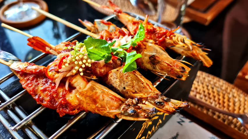 Grilled shrimp skewers served with rice and a fresh side salad, Kuta Selatan Bali