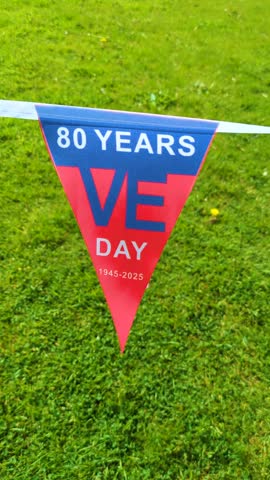 Vertical Video Bunting Flag Showing 80 Years VE Day Celebrations in United Kingdom