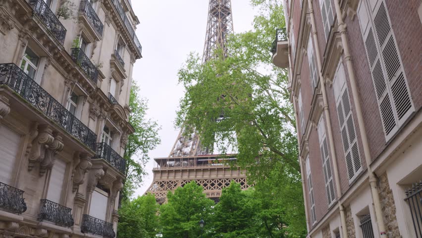 Very beautiful view of the Eiffel Tower from Rue Buenos-Ayres, Paris, France.
