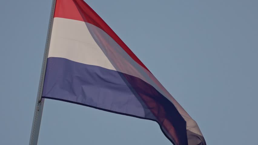 Netherlands flag waving on a flagpole - Powered by Shutterstock - Get 15% off with code: PIKWIZARD15