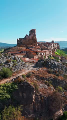 Aerial view of the medieval village of Frias, Burgos, Castilla Leon, northern Spain. Picturesque stone village with a historic castle, surrounded by scenic rural landscape