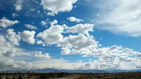 Dramatic Cumulus Clouds Over Desert Landscape - Powered by Shutterstock - Get 15% off with code: PIKWIZARD15