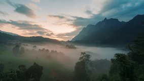 Timelapse landscape of Doi Luang Chiang Dao limestone mountain with foggy flowing over local tribe village among tropical rainforest in the morning at Ban Na Lao Mai, Chiang Dao, Chiang Mai, Thailand - Powered by Shutterstock - Get 15% off with code: PIKWIZARD15