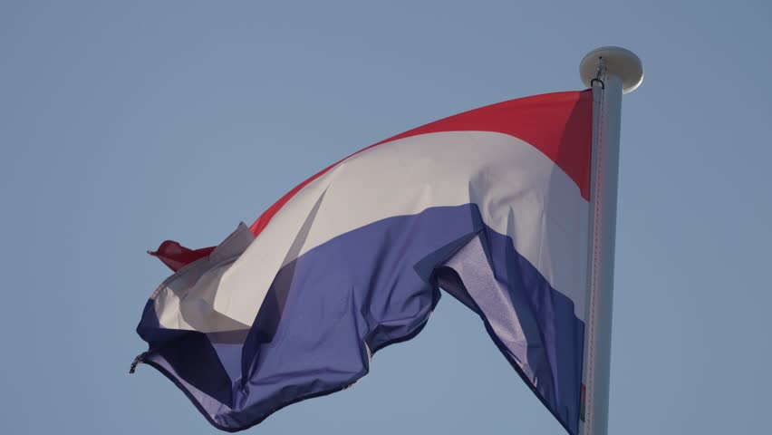 Netherlands flag waving on a flagpole - Powered by Shutterstock - Get 15% off with code: PIKWIZARD15