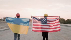 Multicultural team walking with flags on site - Powered by Shutterstock - Get 15% off with code: PIKWIZARD15