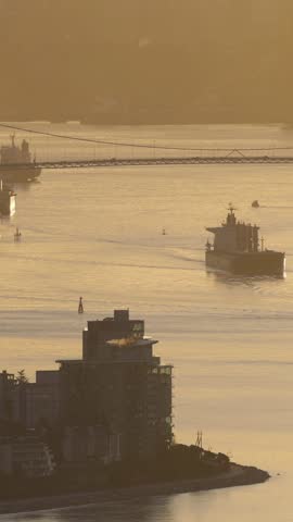 Cargo Ship and Tugboat at Sunrise in Vancouver, British Columbia