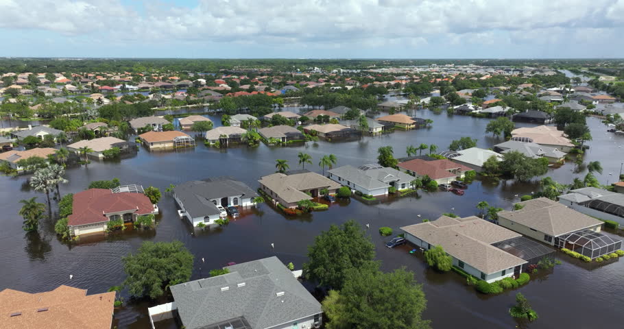 Flooded houses from hurricane Debby rainfall water in Laurel Meadows community in Sarasota, Florida. Aftermath of natural disaster in USA south