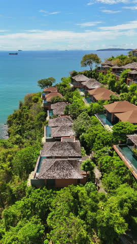 Phuket Islands stunning beauty with high quality drone footage that showcases lush landscapes, picturesque beaches, and the mesmerizing clear blue ocean waters of this tropical paradise. Thailand 